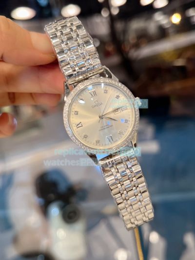 Omega Replica Ladies Watch Silver Dial Diamonds Bezel Stainless Steel Strap 32mm